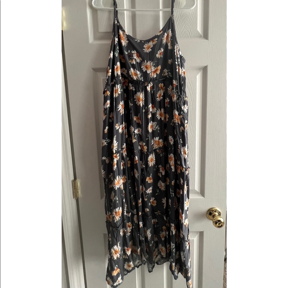Large size dress from Maurice’s￼. Sunflower pattern. Never worn. Tag still on.